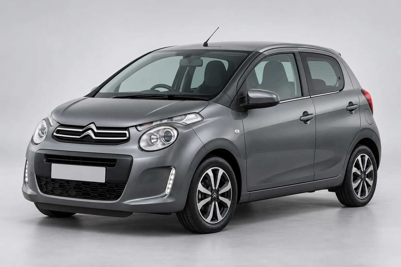 Grey Citroën C1 in a studio — illustrative concept image