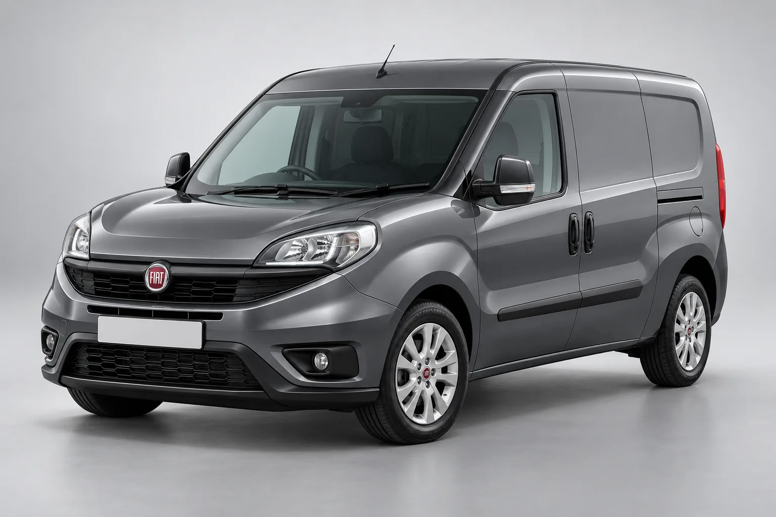 Grey Fiat Doblo in a studio — illustrative concept image