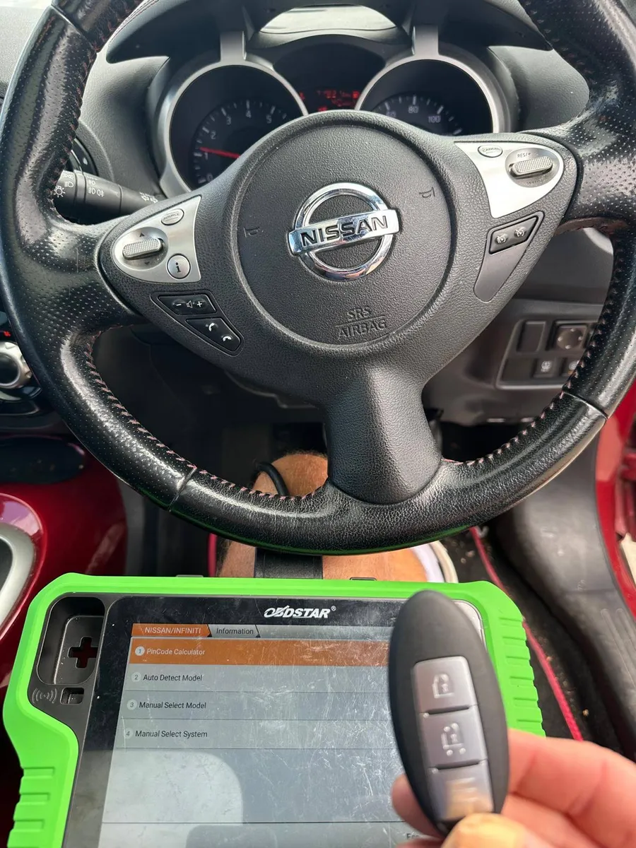Nissan steering wheel, remote key and diagnostic tablet
